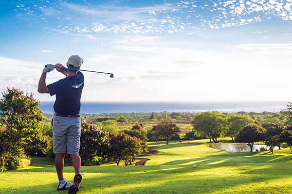 Image of golfer taking a golf swing