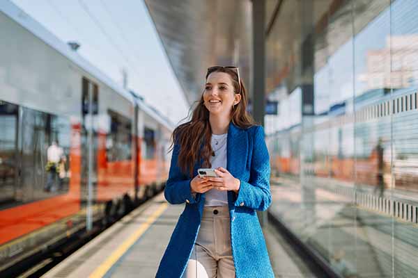 Female passenger at train station